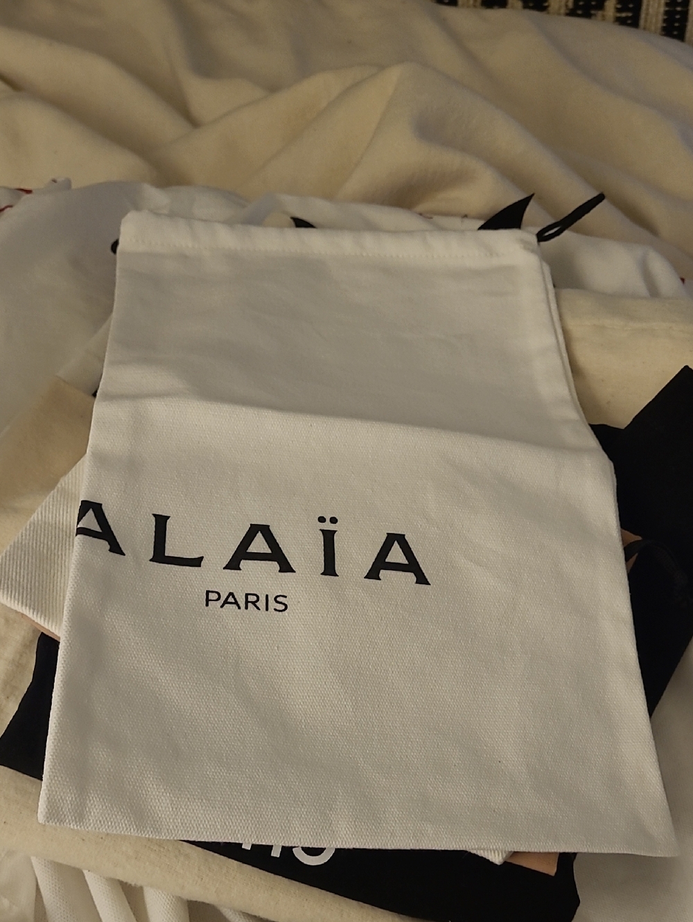 White Drawstring Dust Bag with Black Logo Detail